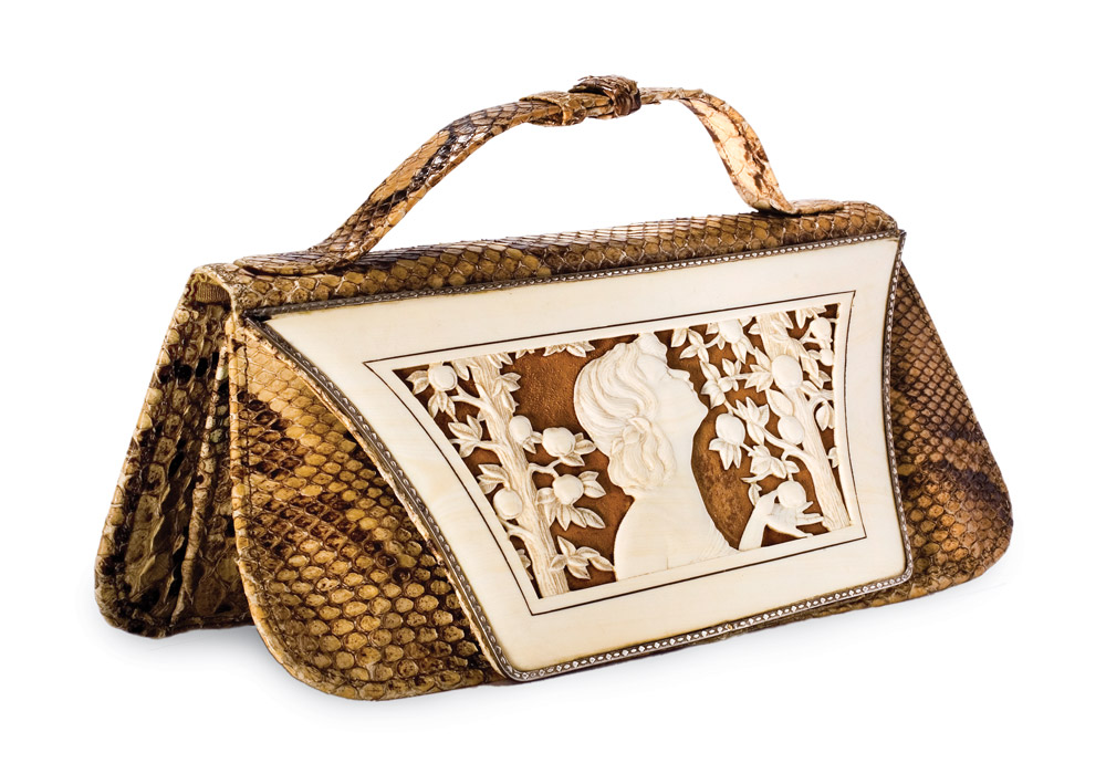 timeline_6 - Victoria Featured at the Tassenmuseum Hendrikje, this German-crafted snakeskin bag has an ivory cover sheet depicting Eve and the apple.