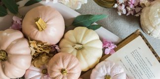 Autumn Romance: Pastel Pumpkins. Viewed from above, a tray full of pale pink pumpkins graces the tabletop.