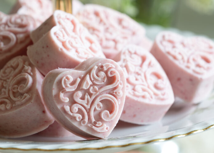 Pink heart candies on a platter