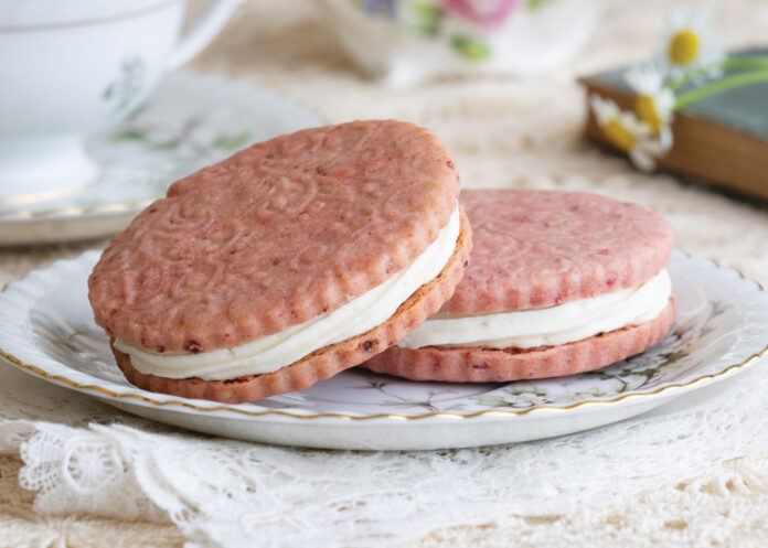 Pink shortbread cookies on a plate
