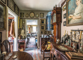 Cottage hallway full of collected antiques