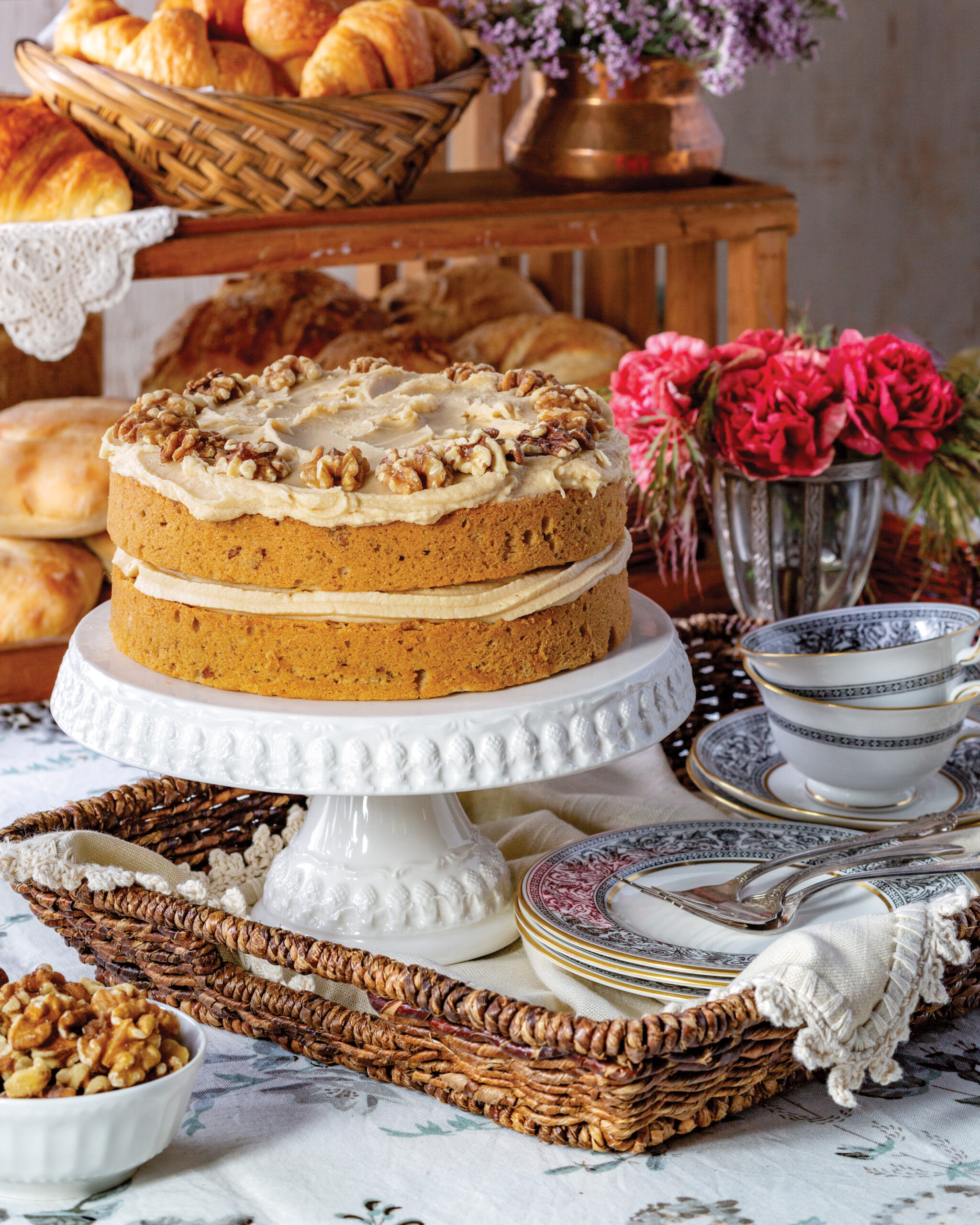 Coffee walnut cake on a a cake stand 