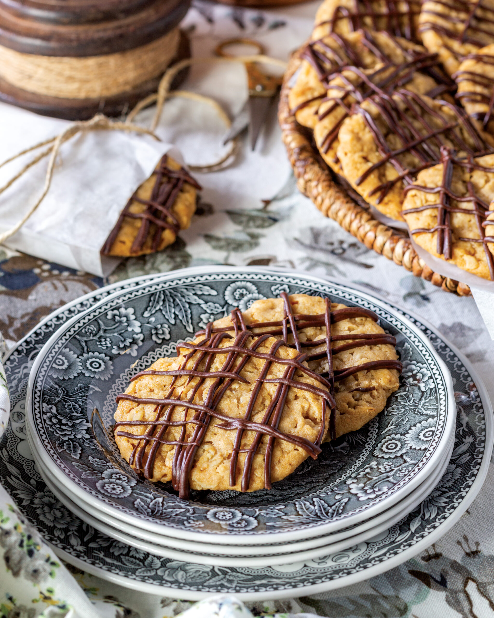 Chocolate hobnobs on a blue plate