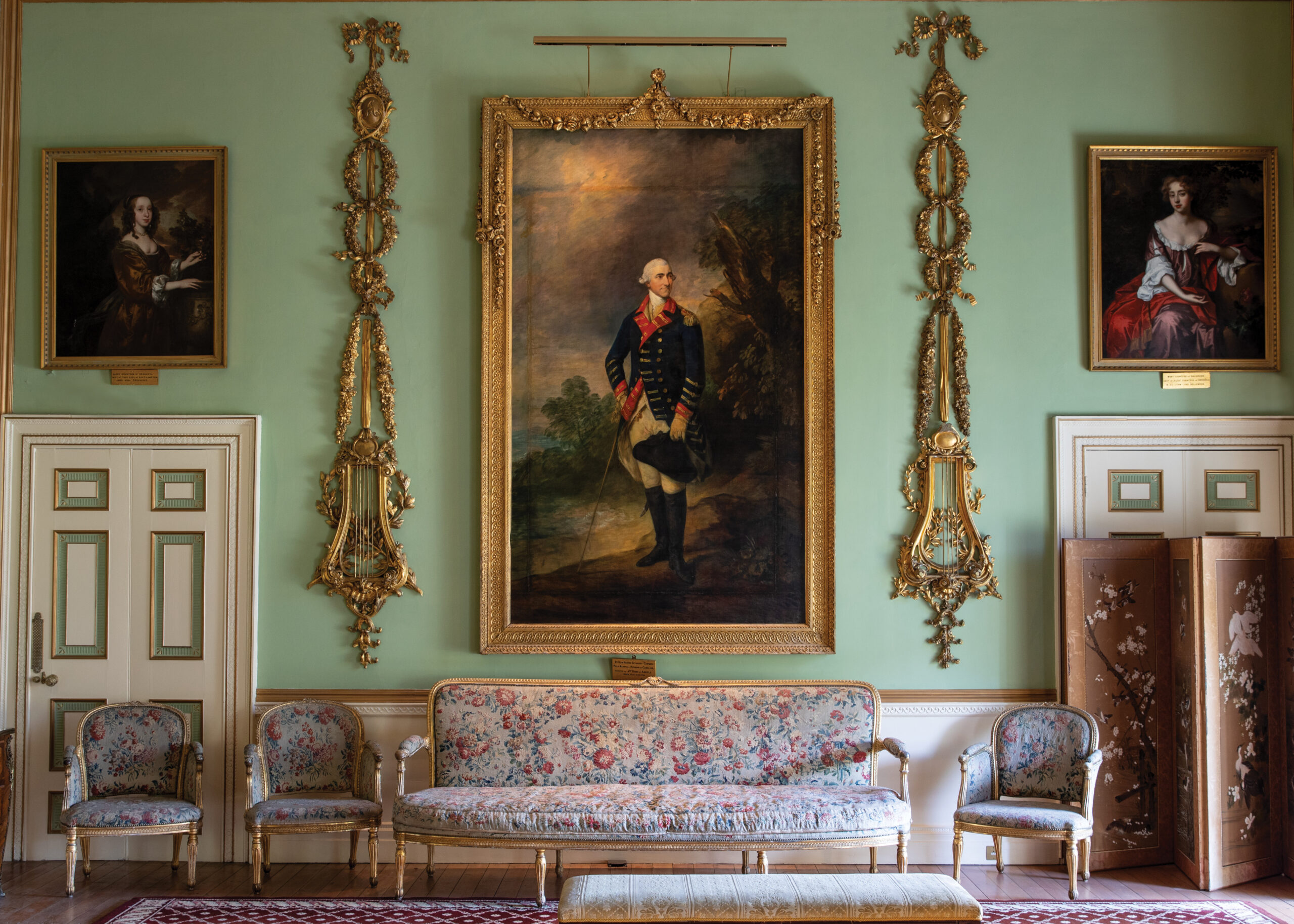 Gold-framed paintings in a castle