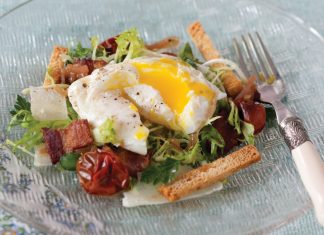 Poached Eggs over Frisée Salad with Roasted Tomatoes
