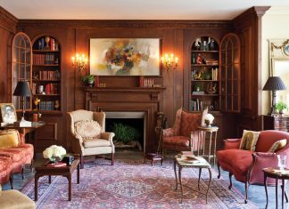 Old-World tradition meets contemporary comfort in the home of Susan and Don Huff, where the patina of aged-oak paneling in the living room serves as a fitting backdrop for character-infused antiques.