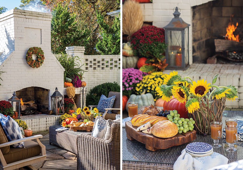 An outdoor fireplace and seating area is decorated with harvest bounty.