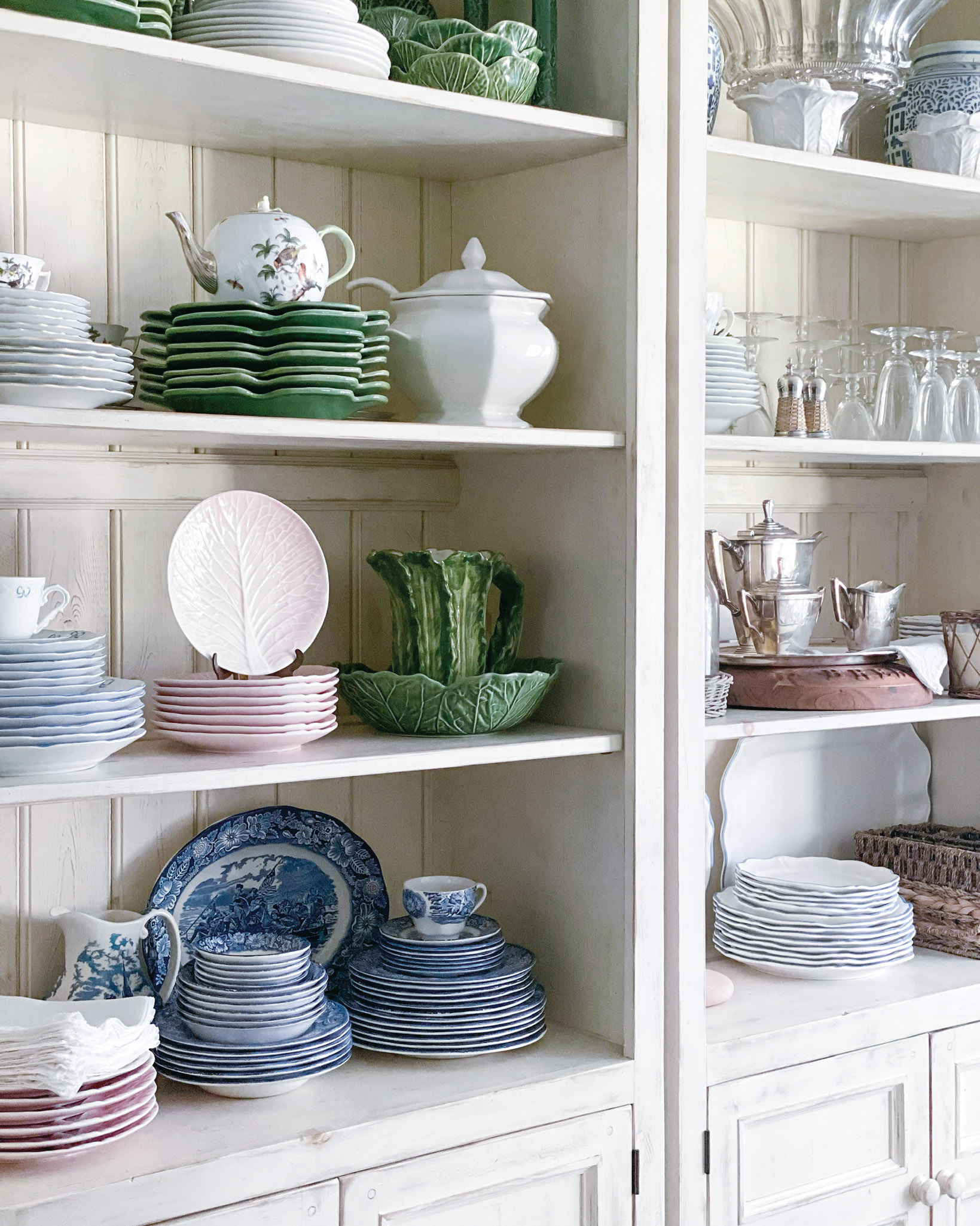Shelves offer a display space for collections of china and tea wares.
