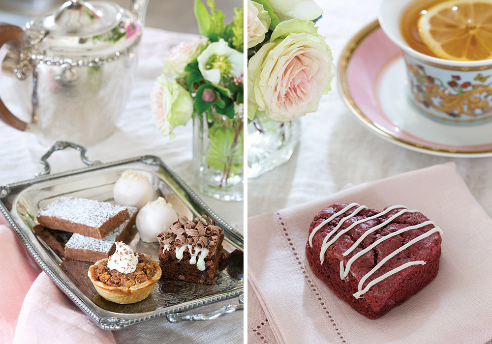 Left: An arrangement of chocolate treats sits atop a silver tray. Right: A heart-shaped red velvet scone sits beside a romantic teacup and small flower bouquet.