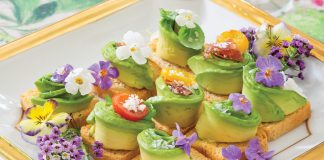 Placed atop a gilt-edged plate, Mini Avocado Toasts feature the brilliant green ingredient in all its’ freshness.