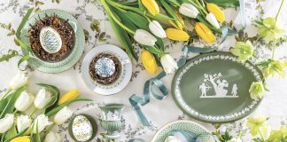Herend porcelain and Wedgwood Jasperware are displayed alongside spring flowers and hand-painted Easter eggs.