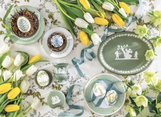 Three Exquisite Styles of Easter Eggs Herend porcelain and Wedgwood Jasperware are displayed alongside spring flowers and hand-painted Easter eggs.