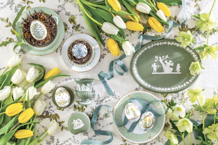 Herend porcelain and Wedgwood Jasperware are displayed alongside spring flowers and hand-painted Easter eggs.
