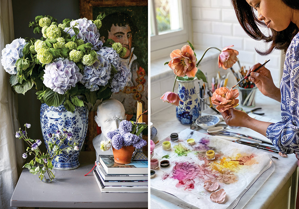 Left: A blue-and-white jar spills forth blue, white, and green blossoms. Right: The artist paints petals beside the natural light of a window.