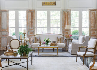 A bright living room expertly combines antique and modern furnishings.