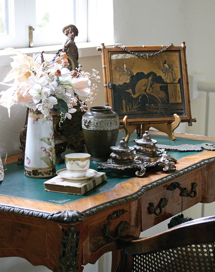 The romantic details of this intricately adorned desk evoke the beauty of France.