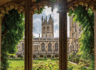 The halls of Magdalen College are filled with history and are as beautiful as they are old. Here, the sun shines beyond the main tower and into the courtyard.