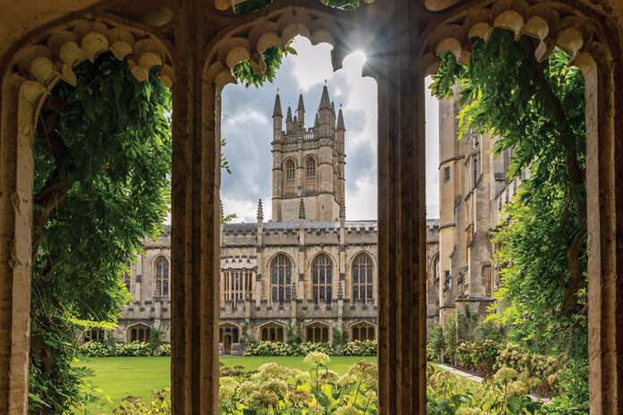 The halls of Magdalen College are filled with history and are as beautiful as they are old. Here, the sun shines beyond the main tower and into the courtyard.