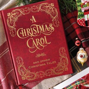 The rich red cover of our latest book club selection, A Christmas Carol, invites readers to revisit this classic tale of Yuletide spirit.