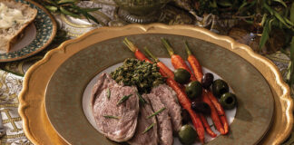 For a hearty entrée, we serve Roasted Leg of Lamb, flavored with woodsy rosemary and the bright citrus of orange zest. The bone-in cut cooks alongside mixed olives and baby carrots and is plated with these tasty components and refreshing carrot-mint pesto.