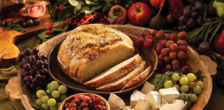 The aroma of fresh-baked Peasant Bread welcomes guests—a recipe reminiscent of the wood-fired loaves warmed in stone hearths centuries ago.