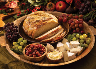 The aroma of fresh-baked Peasant Bread welcomes guests—a recipe reminiscent of the wood-fired loaves warmed in stone hearths centuries ago.