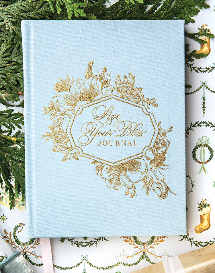 Wrapped in French blue cloth and kissed with gilt pages and lettering, our French Dreams Live Your Bliss Journal awaits the pensive pen.