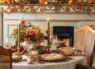 Beside the roaring fireplace, its mantel bedecked in vines and pumpkins, a small round table is set for the loveliest Thanksgiving meal.