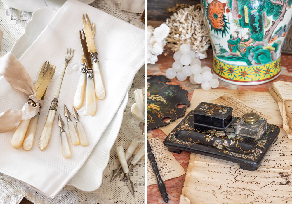 Left: A collection of small dining utensils with mother-of-pearl handles rests atop an alabaster napkin. Right: A black writing desk, including ink well and pen holder, is inlaid with mother-of-pearl.