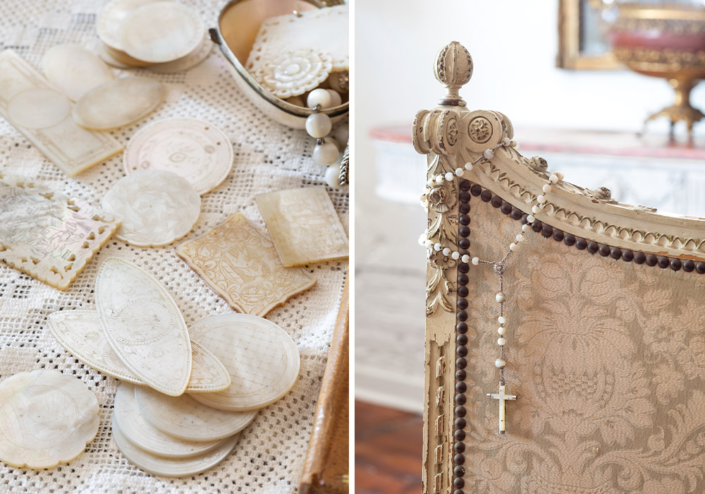 Left: Carefully carved mother-of-pearl game pieces are carefully arranged. Right: A mother-of-pearl beaded rosary hangs from the corner of a chair.