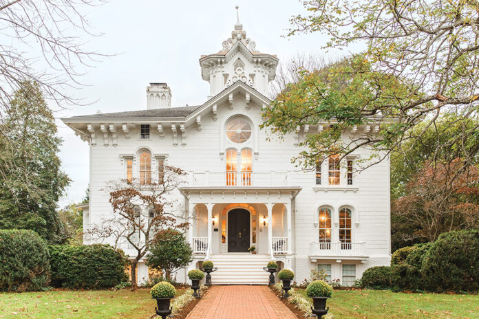 The white Victorian Italianate façade of Mayhurst Estate is an architectural wonder in the Virginia countryside.