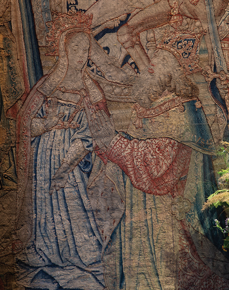 A tapestry located inside Château de Chenonceau illustrates royal figures from history.