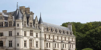 A view of the façade of Château de Chenonceau from the gardens.