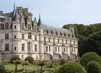 A view of the façade of Château de Chenonceau from the gardens.