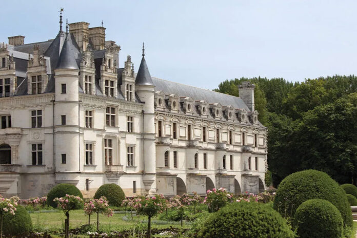 A view of the façade of Château de Chenonceau from the gardens.