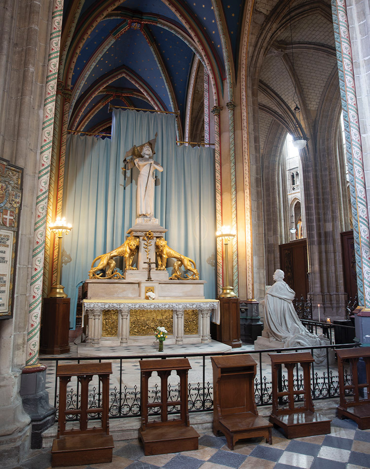 Museum page of Joan of Arc book on the left gridded with a statue of Joan of Arc.