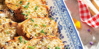 Grilled Garlic Bread is the perfect complement to a lakeside gathering. Each crunchy and buttery slice is a delicious vehicle for several summertime dishes. The smoky kiss from the char is a reminiscent and nostalgic flavor of summer.