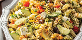 Multicolor rotini echoes the rainbow of hues in Zesty Pasta Salad, boasting summer squash, red bell pepper, cucumber, and kalamata olives.