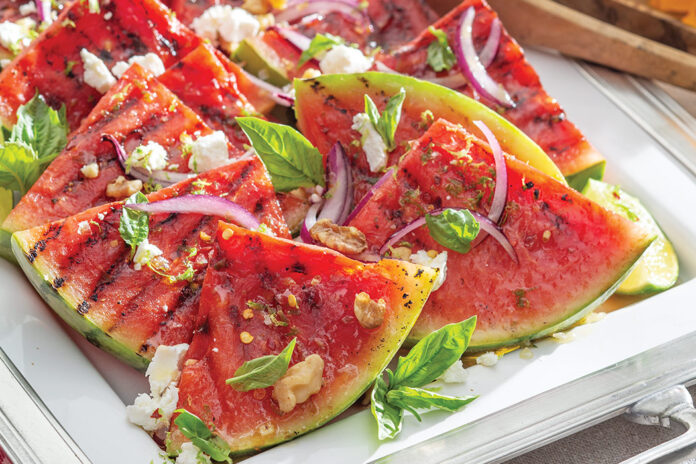  An ideal appetizer for our summer fête, Grilled Watermelon with Goat Cheese and Lime captures the essence of the season. Citrus sugar sweetens the fresh-cut melon slices, which begin to caramelize over the flame of the grill. A sprinkling of herbs and goat cheese readies each slice for the party.