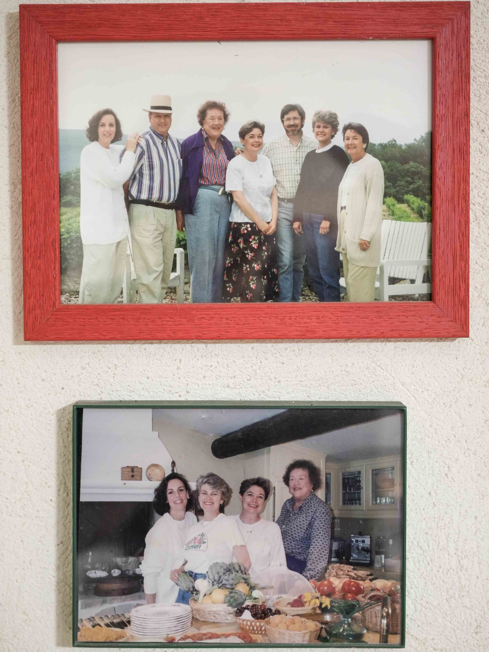 Framed photos including Patricia Wells and Julia Child.
