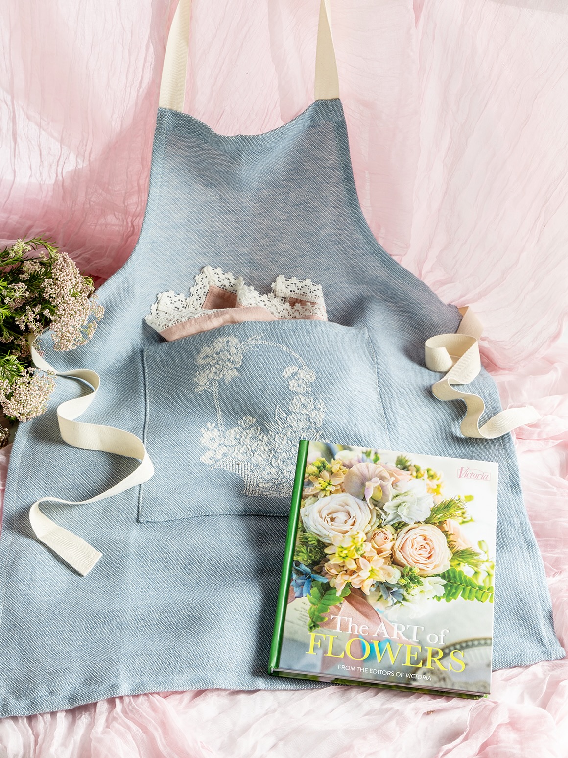 The Victoria floral apron, with the book The Art of Flowers.