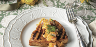 Swordfish Steaks with Tangerine Salsa on a plate.