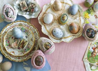 Hand decorated easter eggs in pastel hues derived from natural plant dyes, adorned with vintage easter imagery.