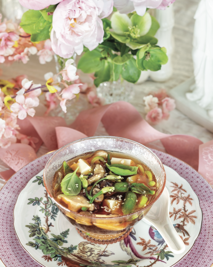 Sugar snap peas lend verdant appeal to Springtime Miso Soup, a steaming vegetable broth showcasing mushrooms and green onions.