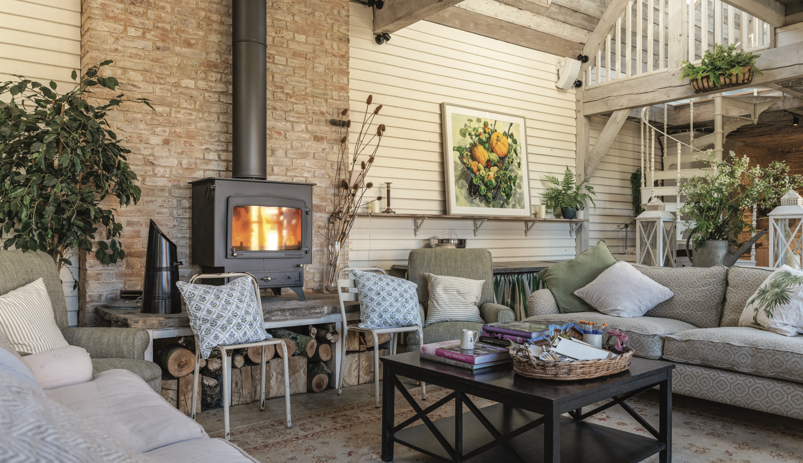 An outdoor living room with a stove at Ashbrook.