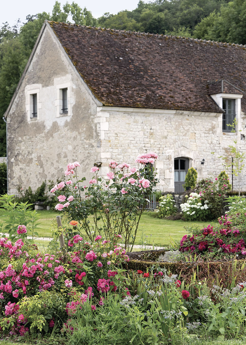 Amid the peaceful embrace of France’s countryside, storied stones and modern-day comforts mingle in a picturesque abbey. Within this luxurious hotel and event space, travelers find an enchanting escape into heritage and beauty.