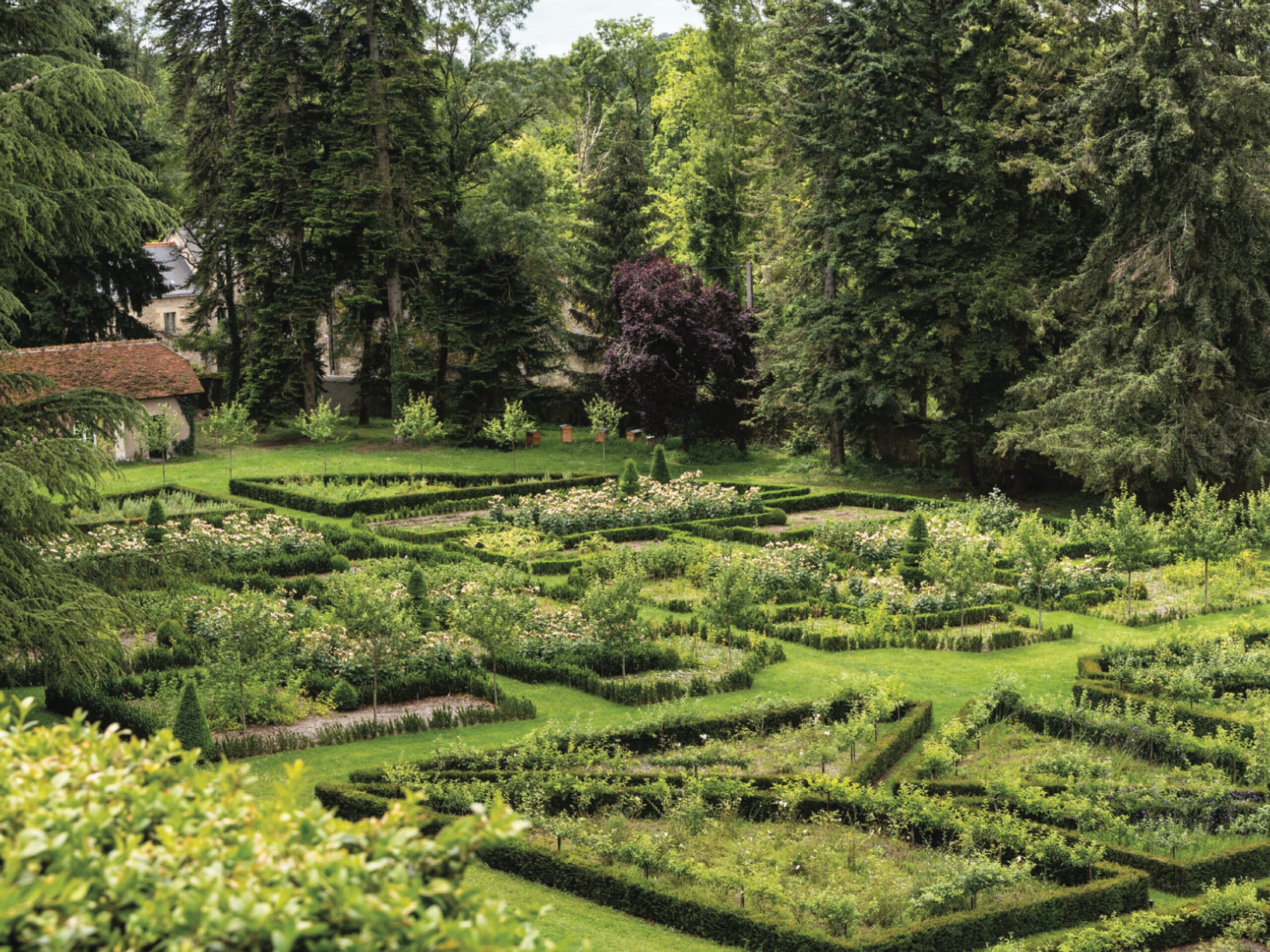The neat formal garden of Chateau Louise.