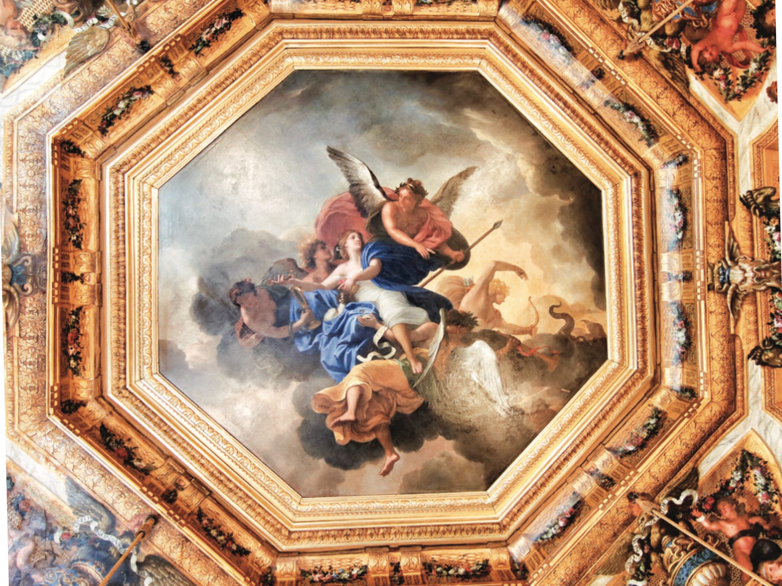 An elaborate painted fresco on the ceiling of The garden façade of Château de Vaux-le-Vicomte, including angels and saints.