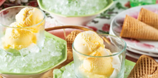 Mango sorbet in glasses next to ice cream cones