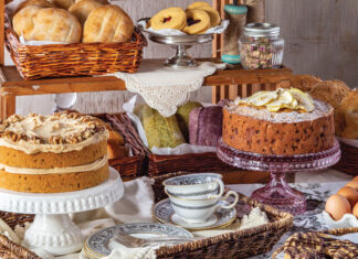 Assortment of breads, cakes, and cookies on a table